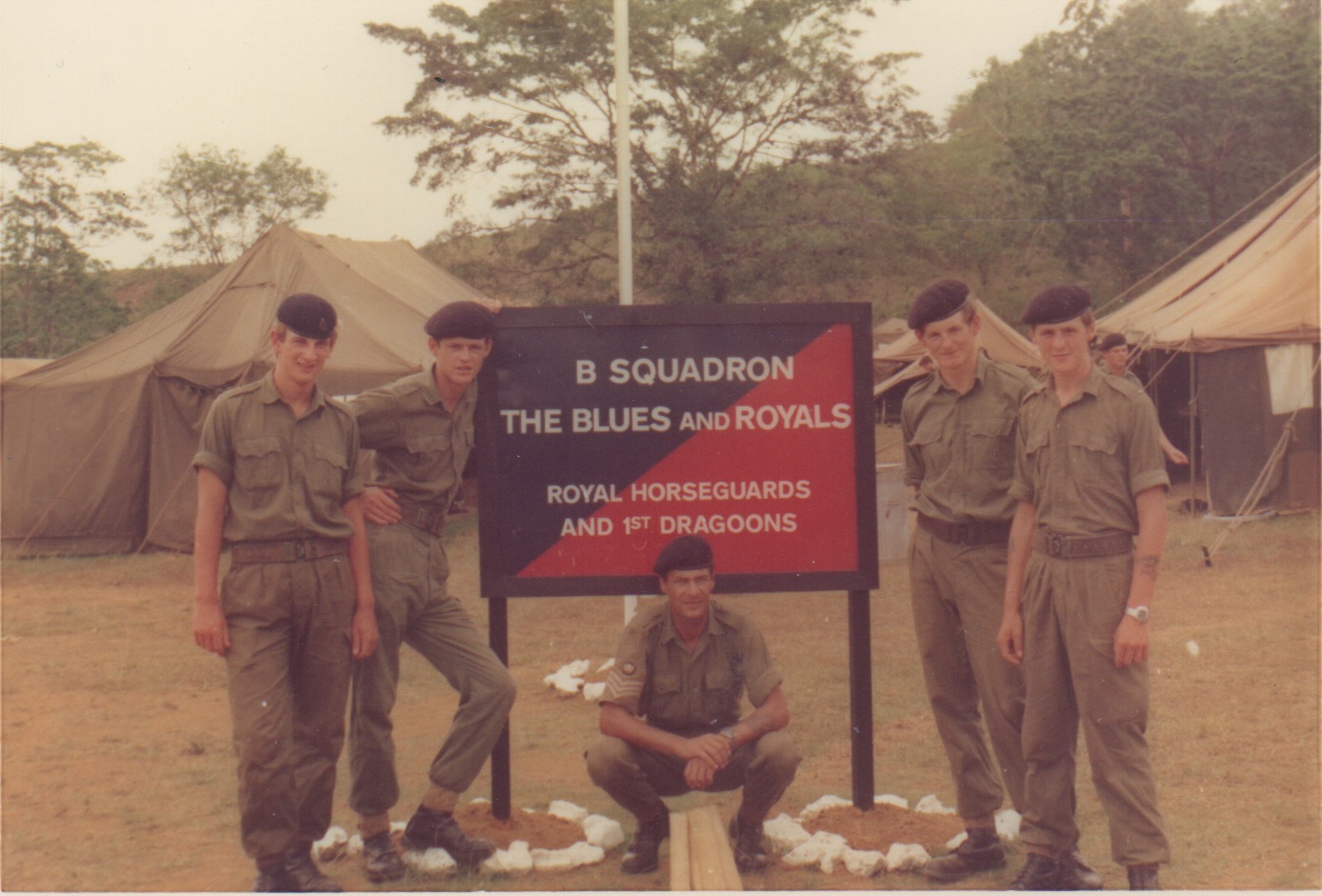 Soldiers in front of Blues and Royals sign in Jamaica
