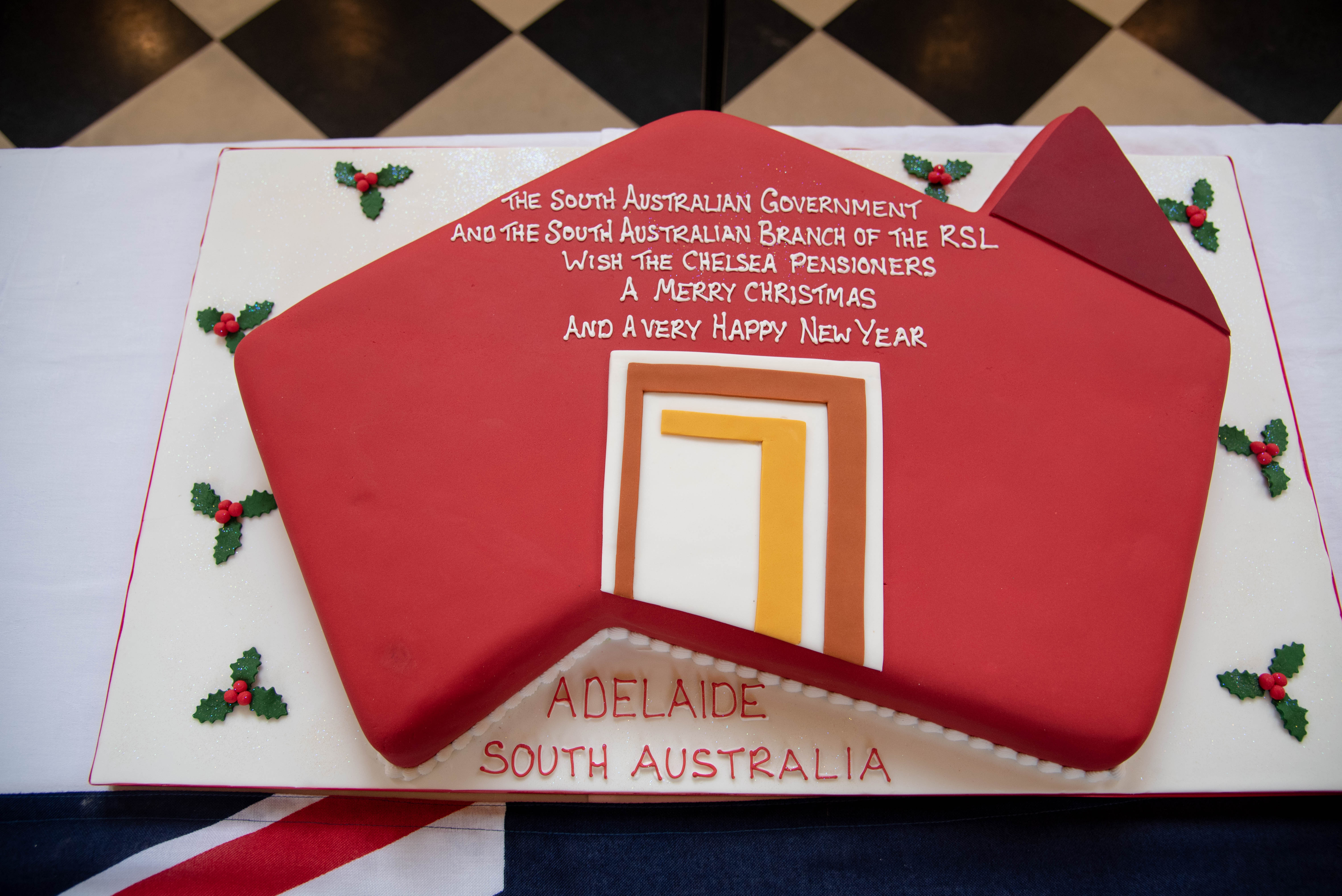 This year's cake shaped in the Adelaide logo
