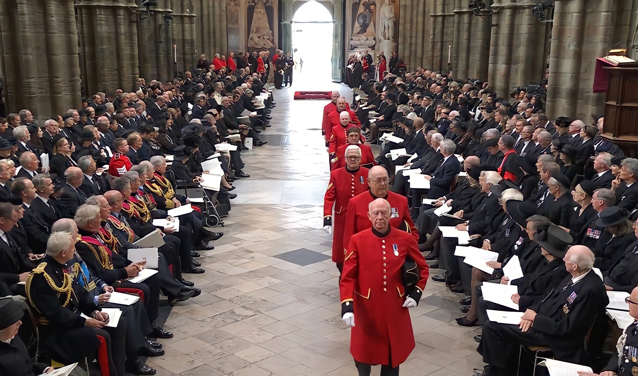 Chelsea Pensioners parade into Westminster Abbey for HM The Queen's Funeral