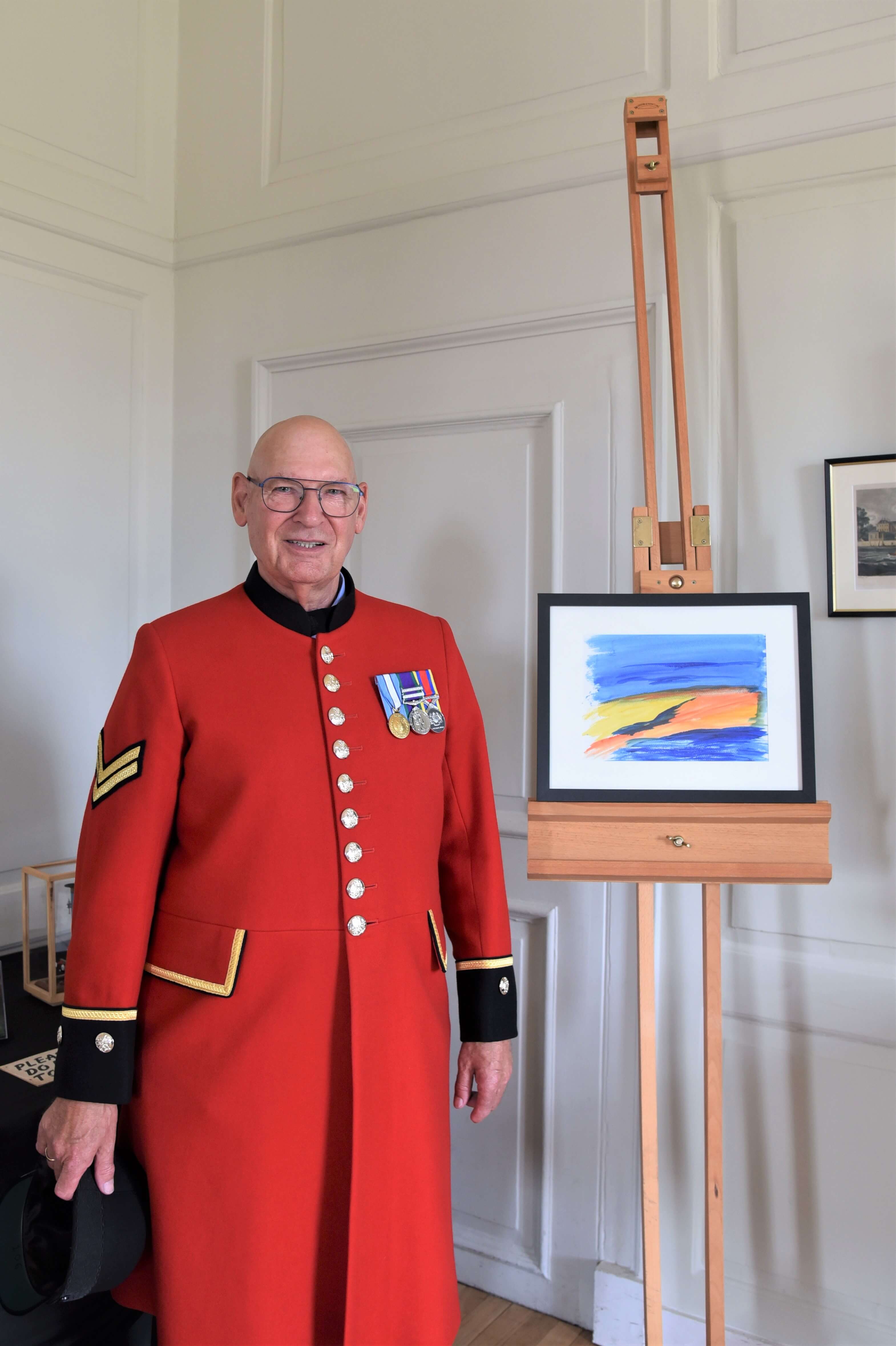 Chelsea Pensioner Roger Hall with his atmospheric painting 