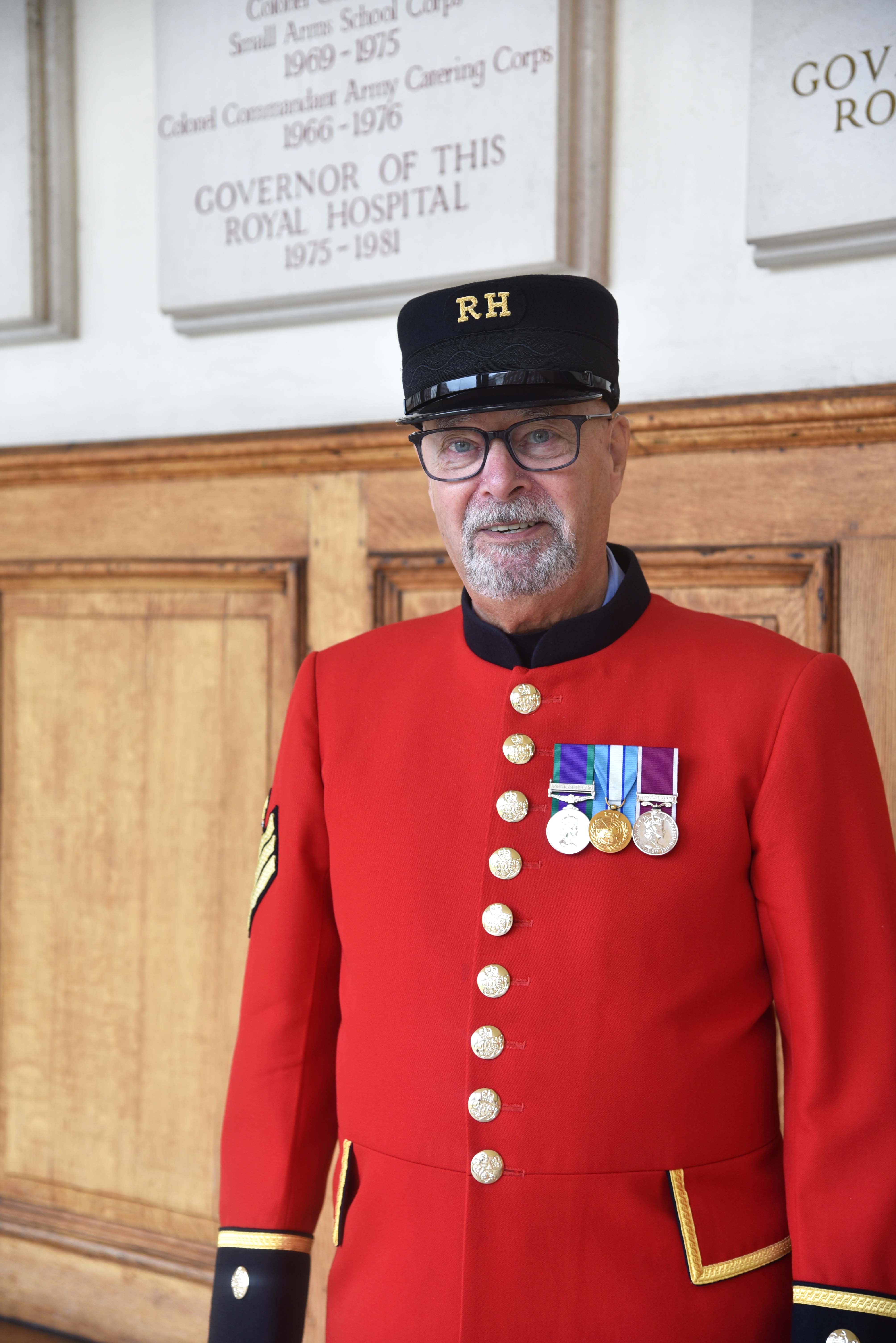 Chelsea Pensioner Barry Harman in scarlet uniform